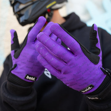 bold. Purple SWIFT MX GLOVES