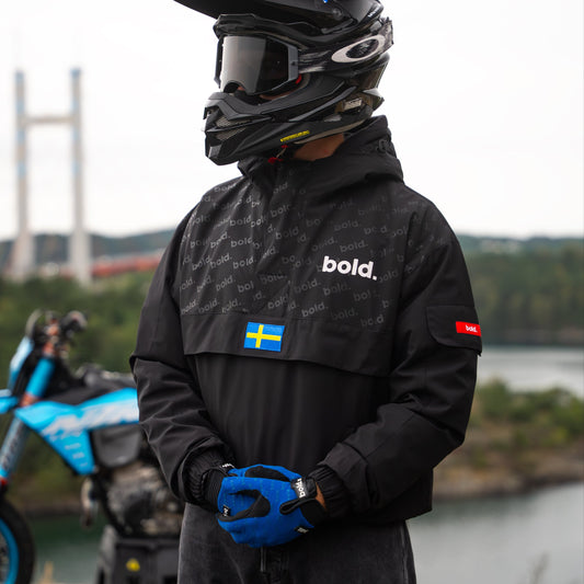 bold. Freedom Windbreaker