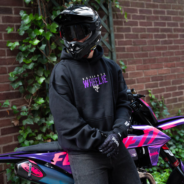Unleash Your Style with the Backpackwheelieboyz Purple Slash